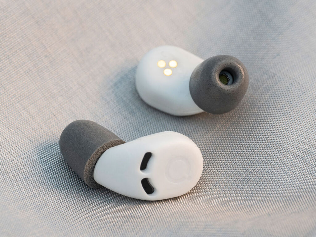 A close up of the earbuds and their memory foam tips