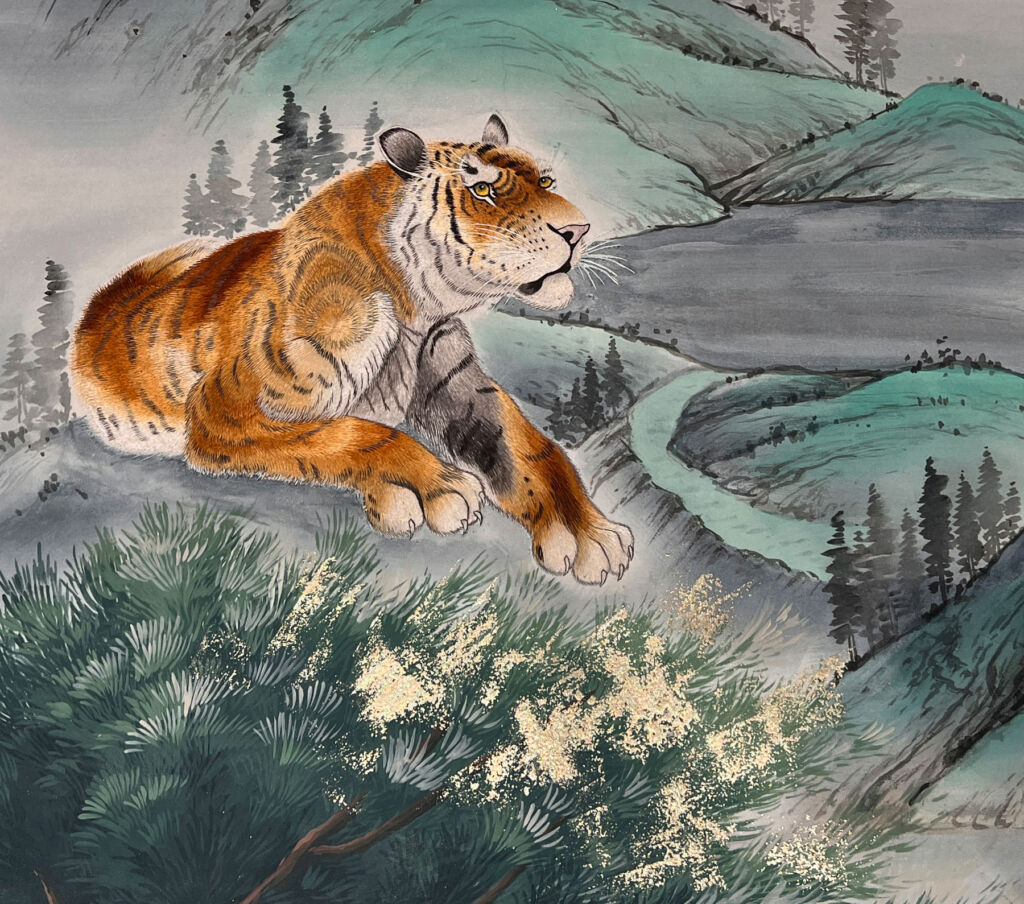 A close up view of the Tiger on the wallpaper