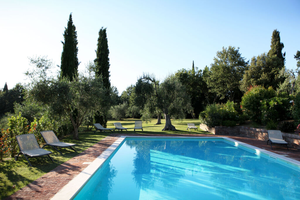 The swimming pool and grounds at Villa Fagnana