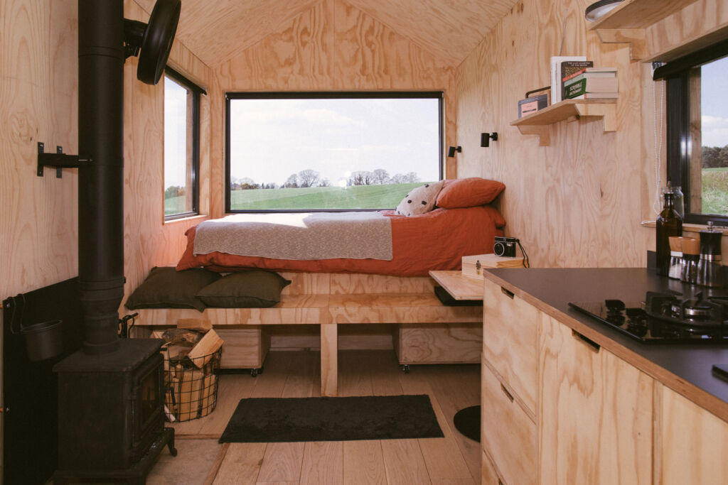 The bed in the cabin with its views over the countryside