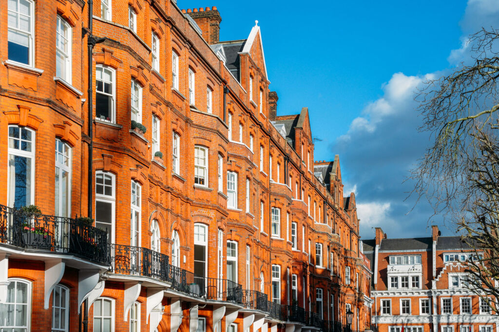 A row of red brick houses in London