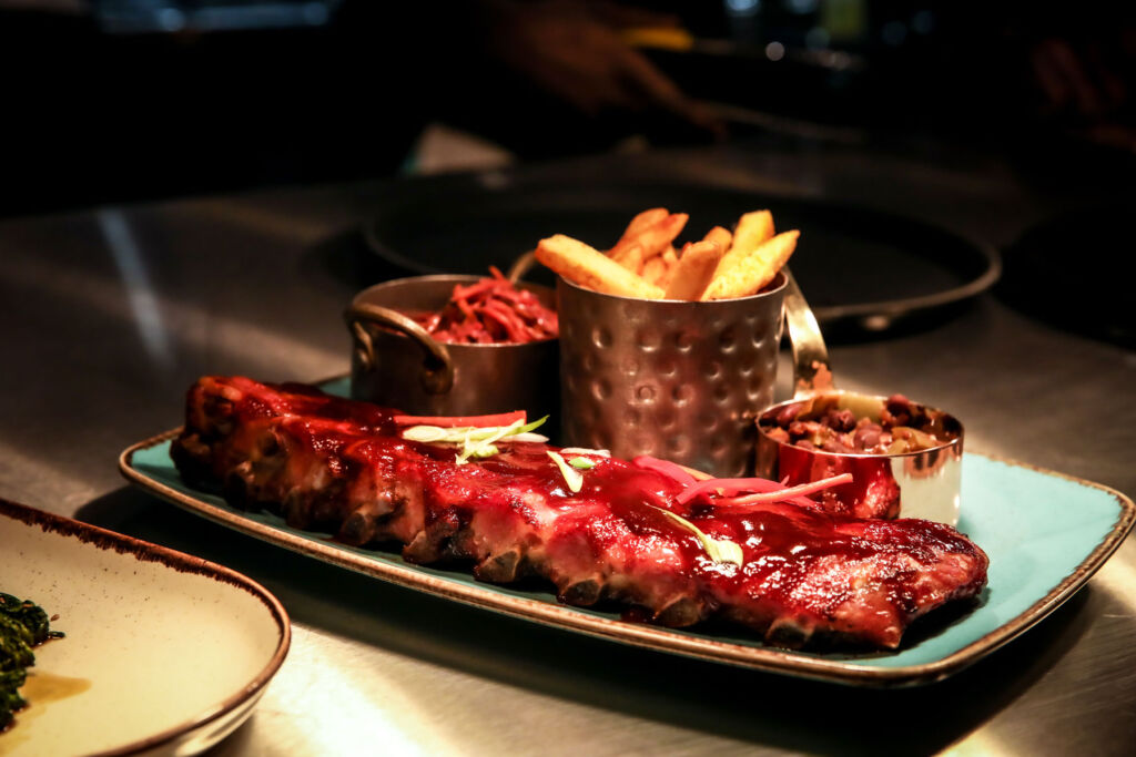 A plate of baby back ribs