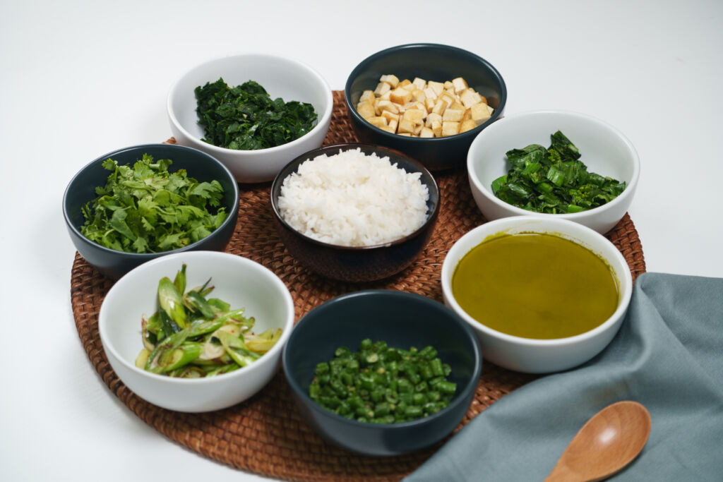 Multiple bowls filled with ingredients for putting a tasty dish together