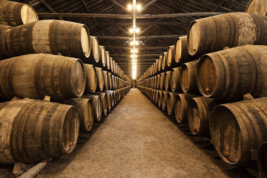 A huge number of whisky barrels in a distillery warehouse