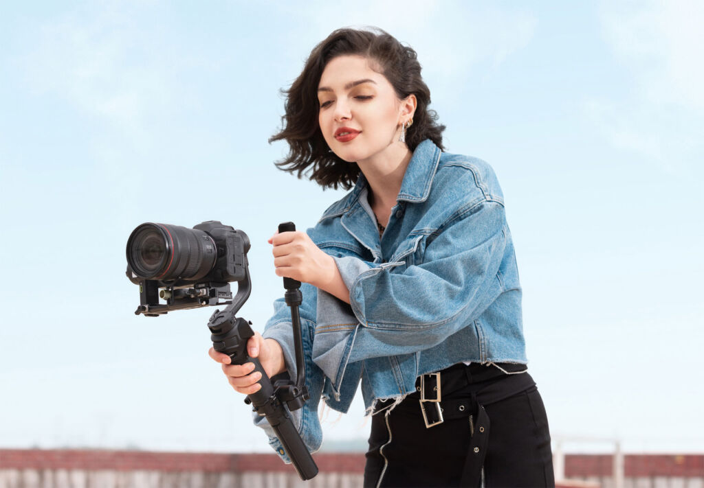 A woman using the gimbal with both hands