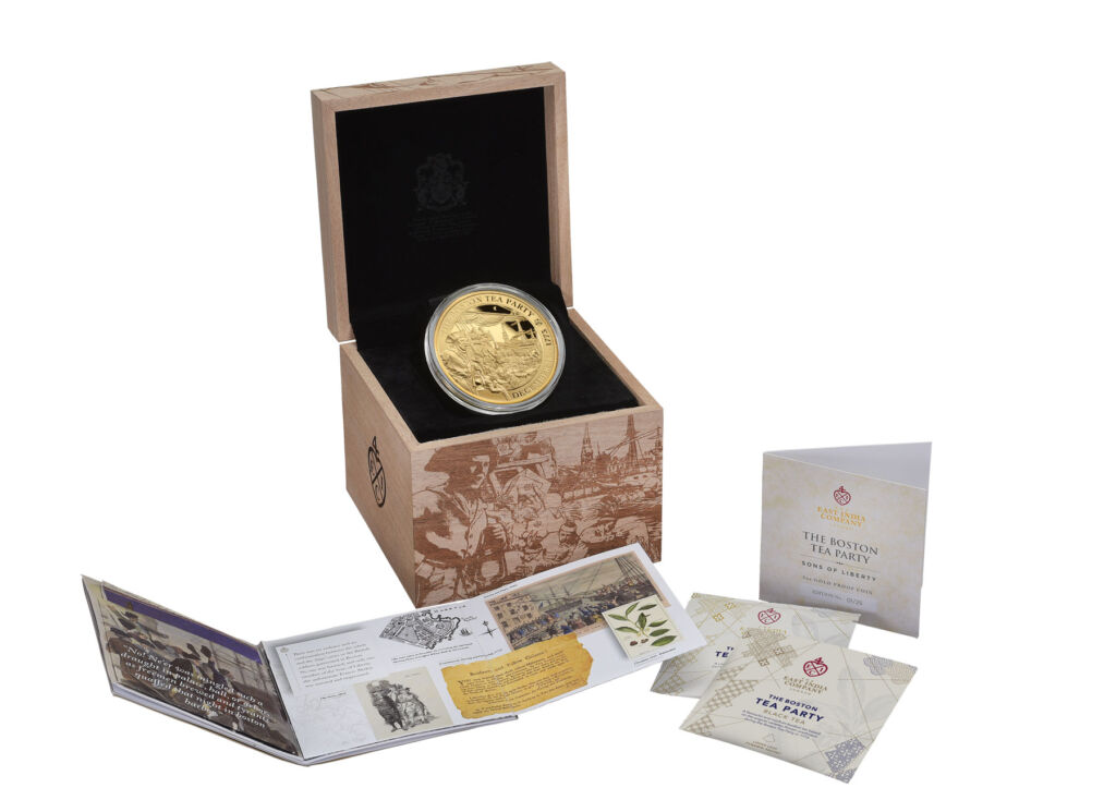 The 5 ounce gold coin in its wooden presentation box
