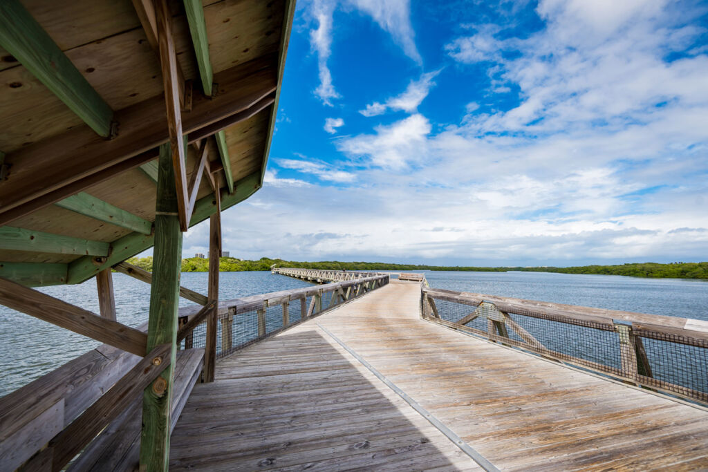 The long over-water wooden walkway at John D Macarthur State Park
