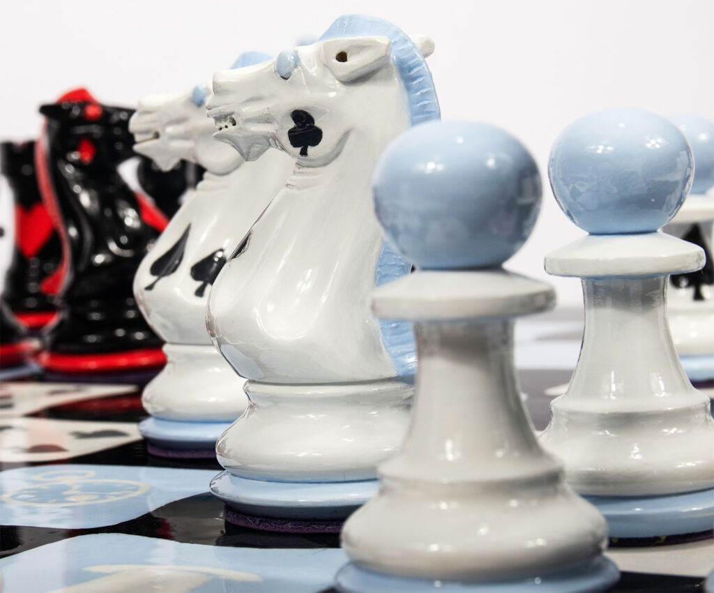 A close up look at the hand painted chess pieces