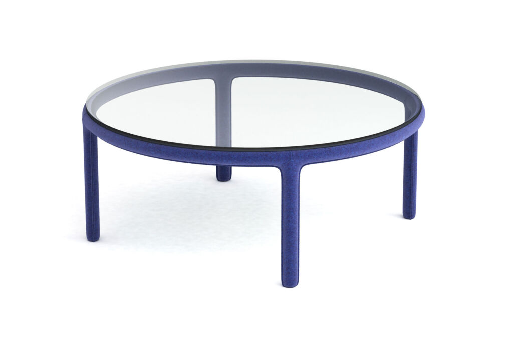 A blue coloured stand coffee table designed by Frank Chou