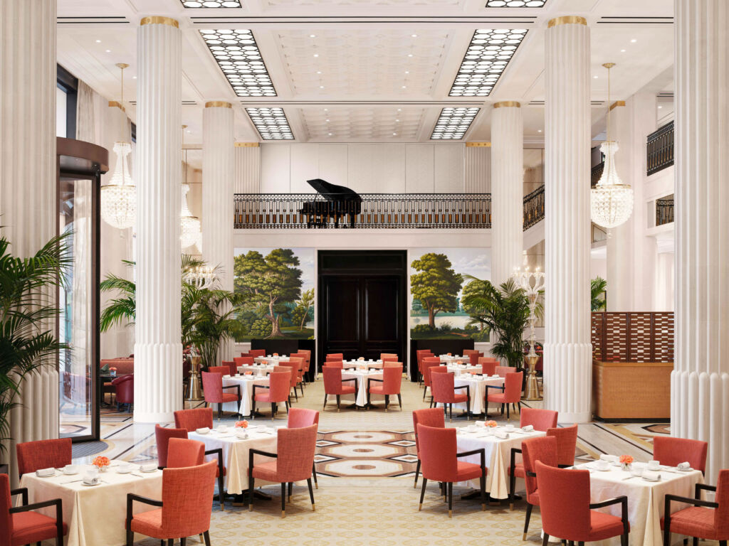 The hotel's spectacular lobby with a grand piano on the mezzanine level