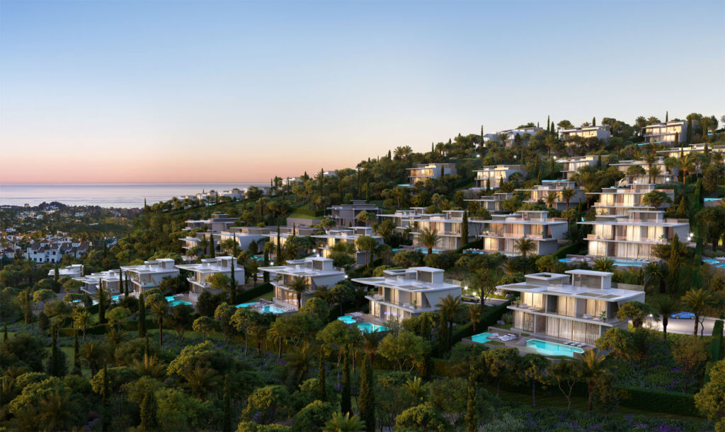An aerial view of the luxury development at sunset