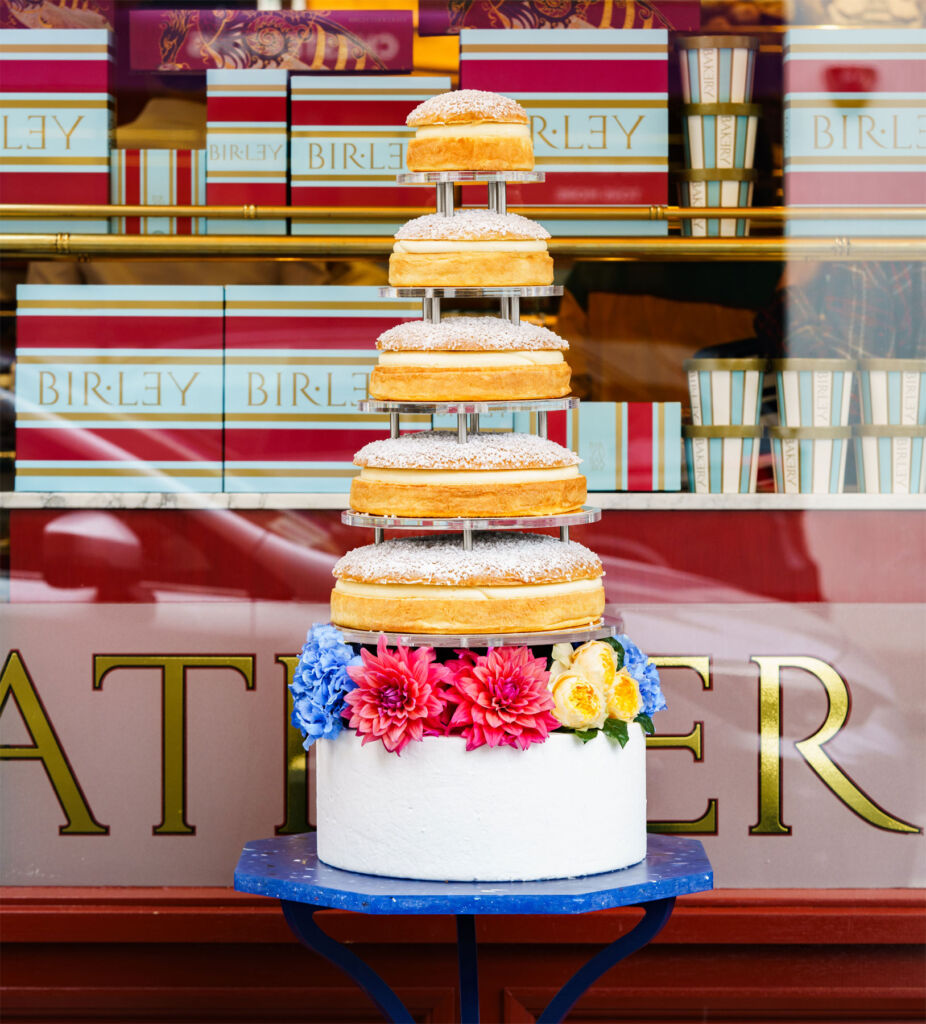 A photograph of the multi-tiered cake
