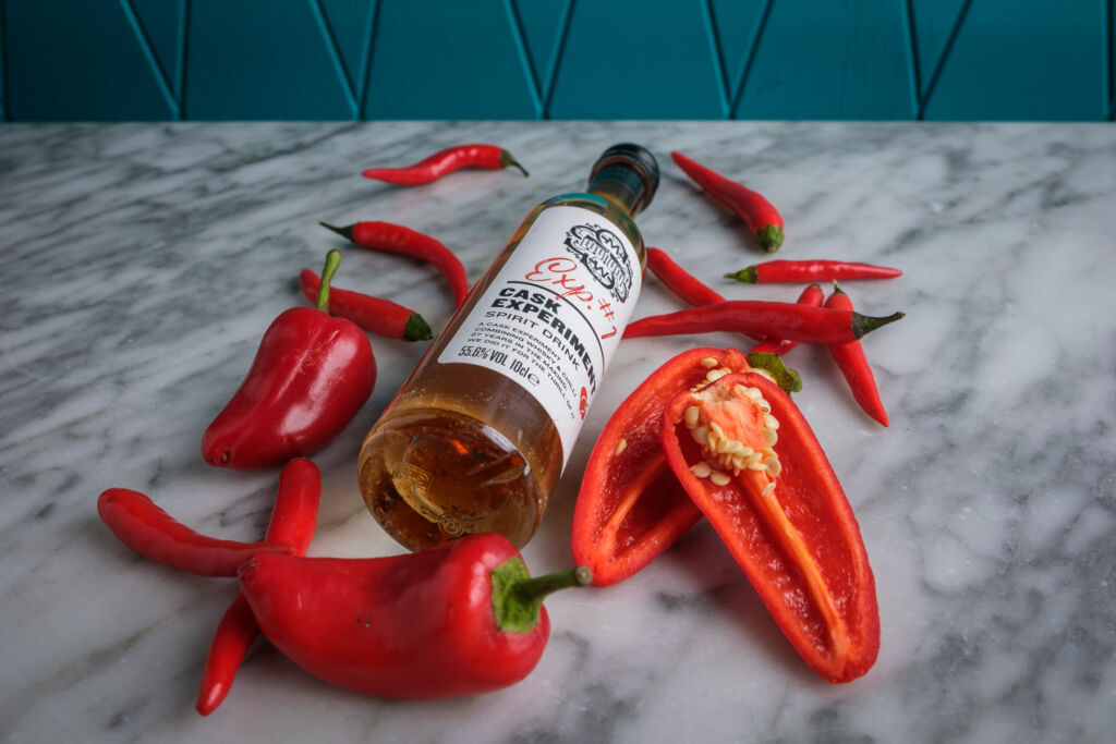 The very special whisky surrounded by fresh chillies