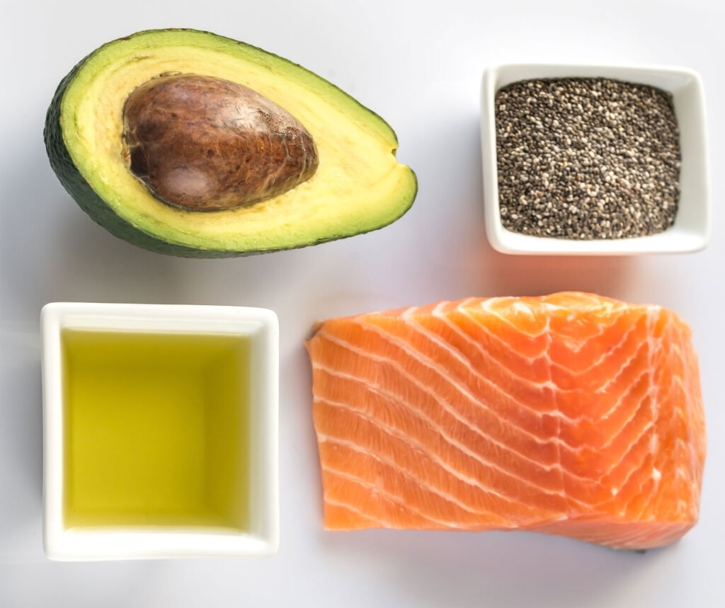 Salmon and avocado, both of which contain Omega 3 oil