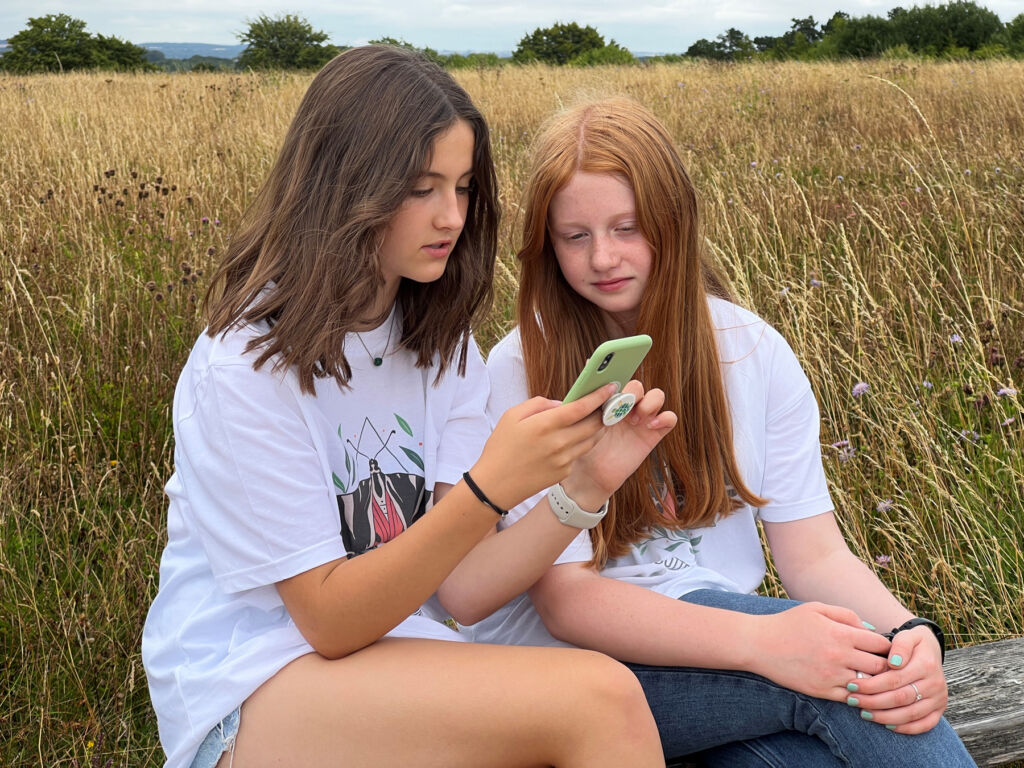 Hattie and Georgia logging what they found on a phone app