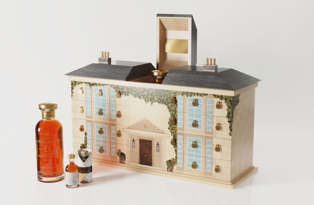A case in the shape of a Mansion house, with bottles inside it