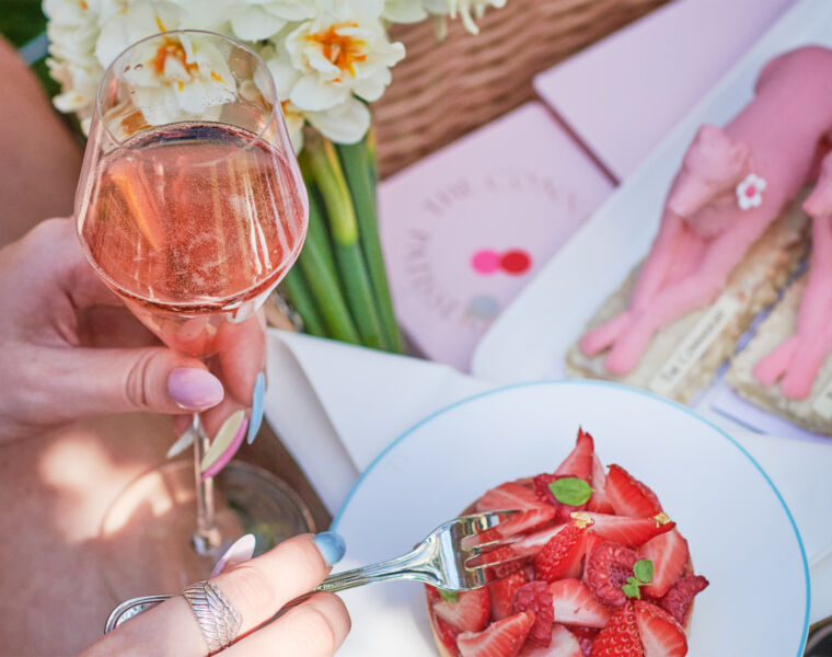 A glass of Rose being enjoyed at an outdoor tea