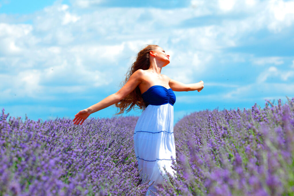 A woman feeling free in a Lavender field