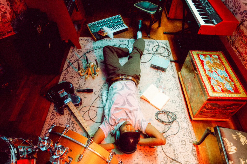 A man relaxing on the floor of the studio
