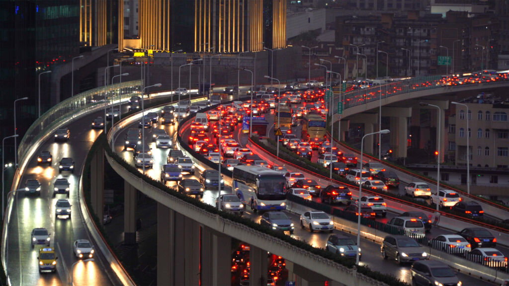 A photograph of a traffic jam in China at night