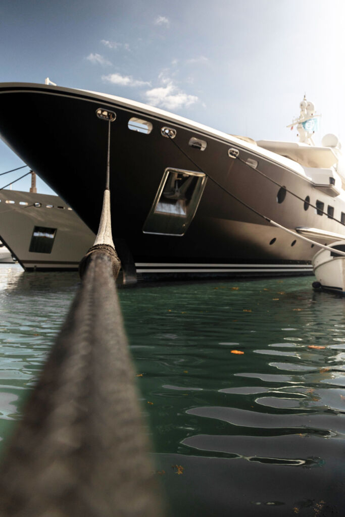Superyachts, tethered side-by-side in a marina
