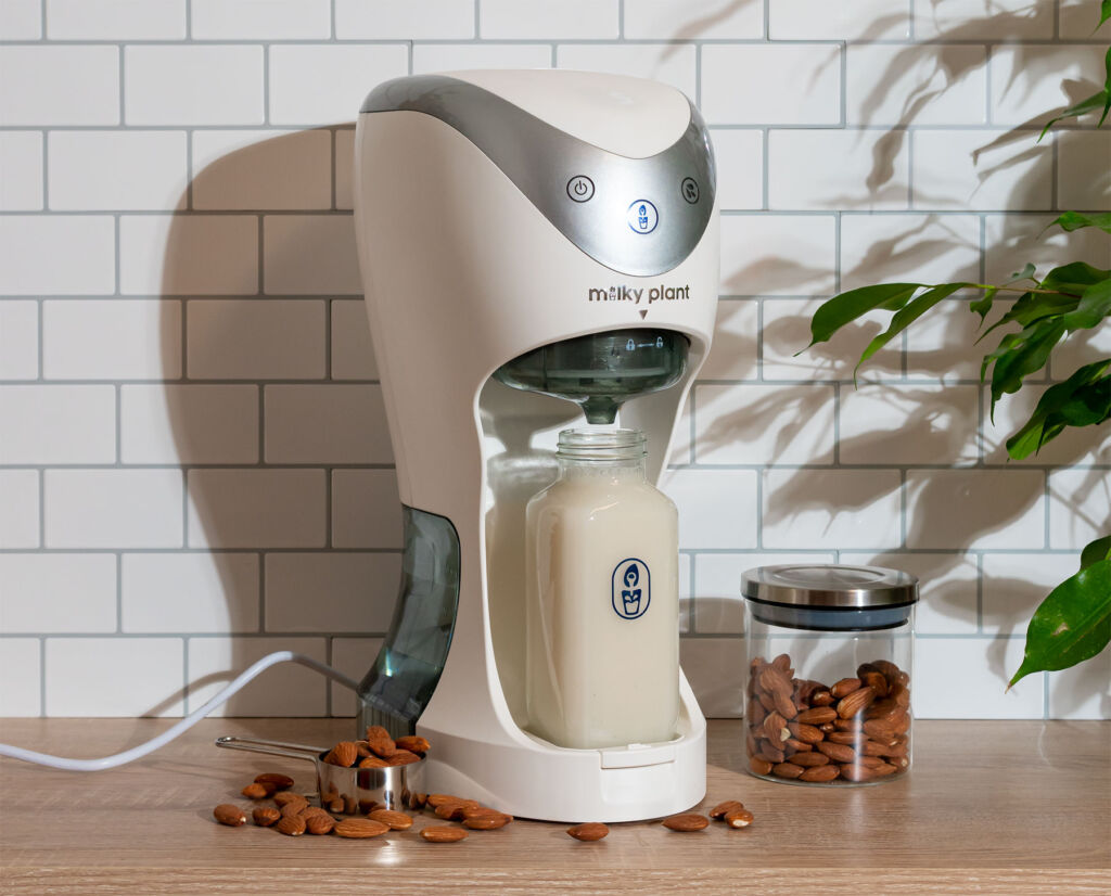 The plant-based milk-making machine on a kitchen worktop