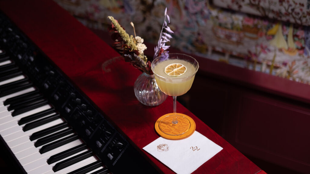 One of the rock inspired cocktails on top of a keyboard