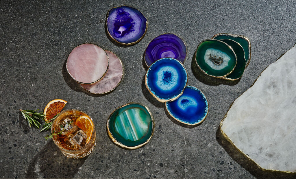 The multi-coloured gold-trimmed coaster set made using natural stones