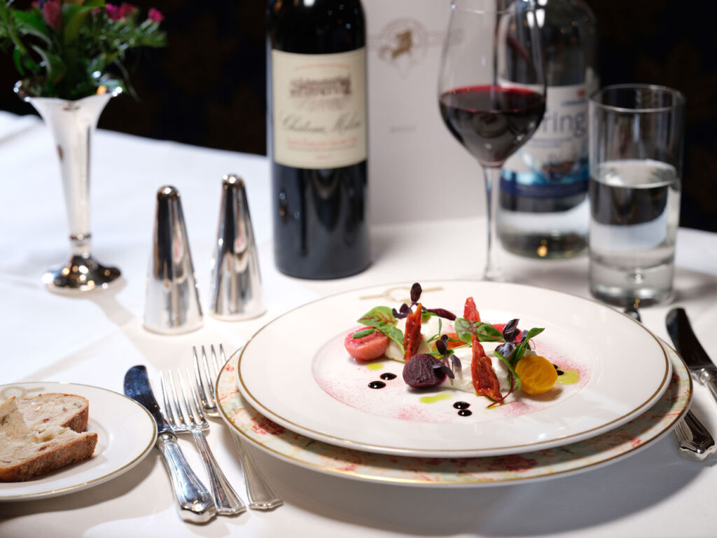 A photograph of a goats cheese dish on one of the carriages dining tables