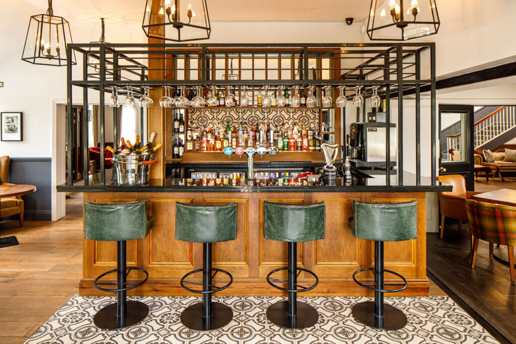 The bar in the hotel with traditional leather seats