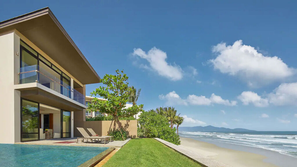 A photograph of the resorts beachfront pool villas
