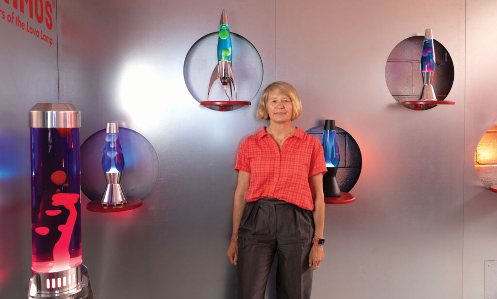 Cressida Granger in her new showroom surrounded by lava lamps