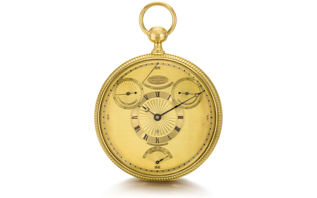 A close up view of the pocket watches dial