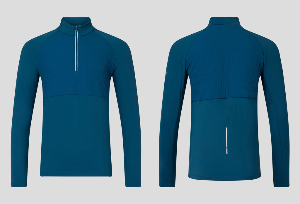 Castore's dark teal colour top from the Rise collection