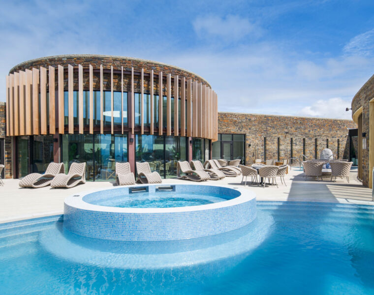 The spectacular exterior of the spar building with its outdoor pool
