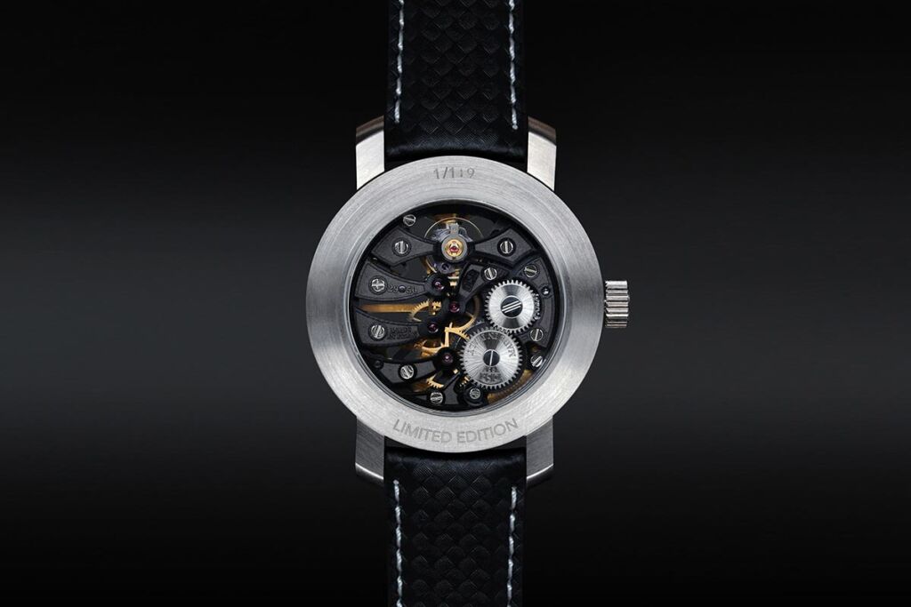 The exposed caseback showing the movement powering the watch