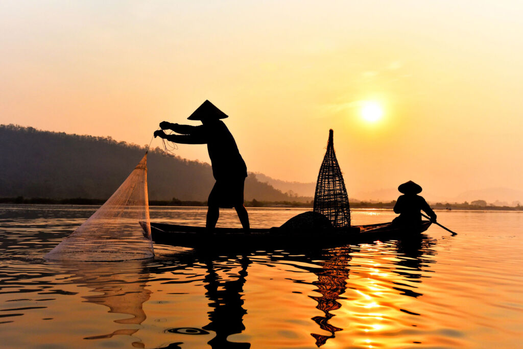 Traditional net fishing in Southeast Asia