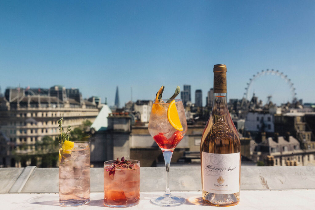 A selection of drinks with London's iconic skyline in the background