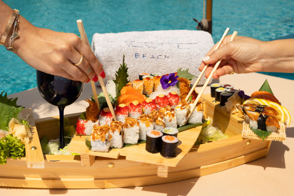 Guests enjoying sushi at Azure beach