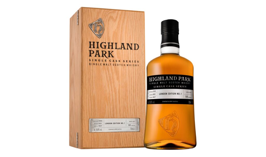 A bottle of the Highland Park London Edition standing next to its wooden case