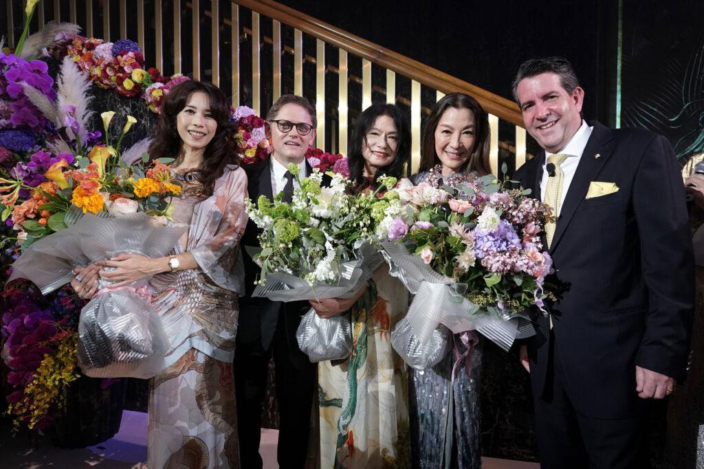 A photograph of Ms Karen Mok, Mr Laurent Kleitman, Ms Vivienne Tam, Ms Michelle Yeoh, and Mr Greg Liddell