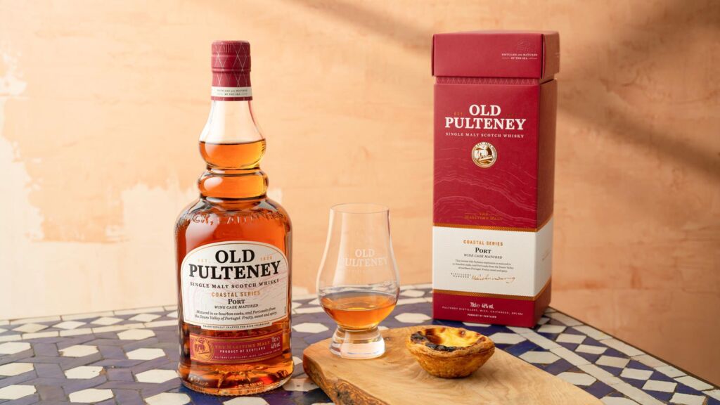 A bottle of Old Pulteney Port on a table next to its box