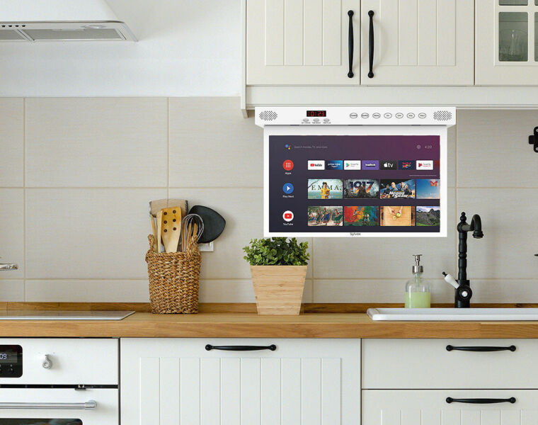 The purpose built kitchen TV mounted under a cabinet