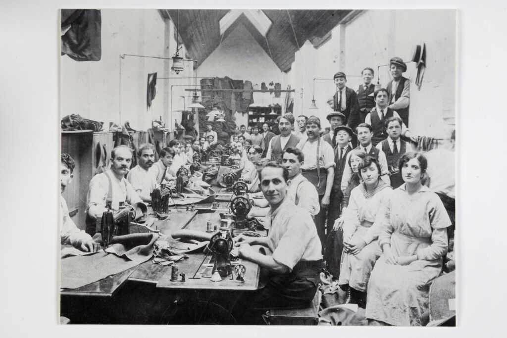 People working inside Schneiders Garment Factory, Stepney
