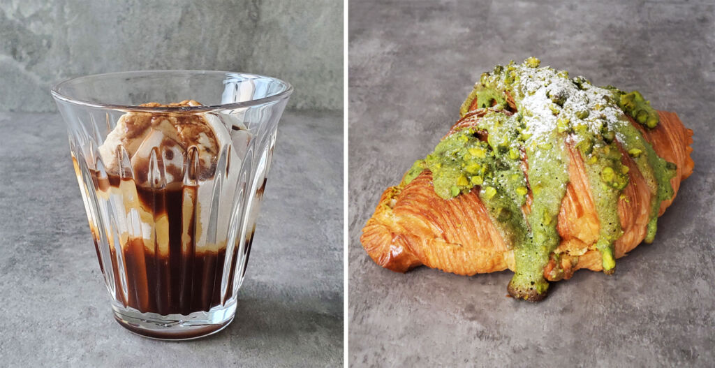 A photograph showing one of the drinks and a croissant covered with pistachio