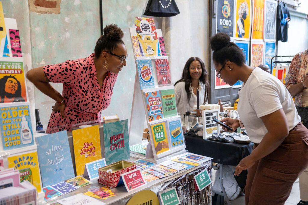 People having fun browsing the handmade products at the Black Culture Market