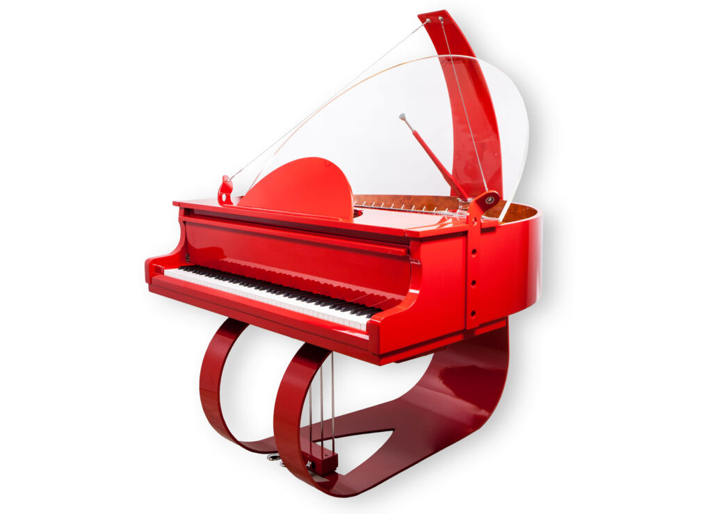 One of the company's unique piano designs in a bright red colour