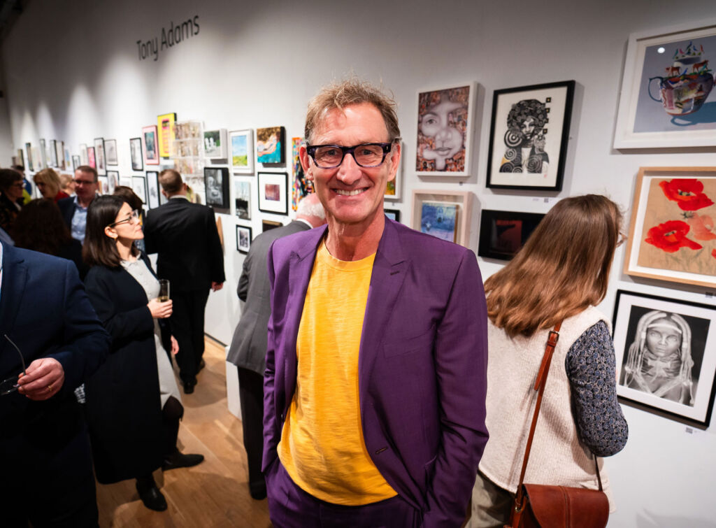 Tony Adams M.B.E, sporting a broad smile at the exhibition