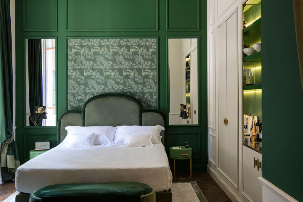 The classic green decor inside one of the hotel's bedrooms