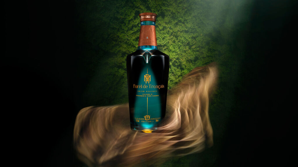 A bottle of the whiskey on a computer generated background with rays of sunlight